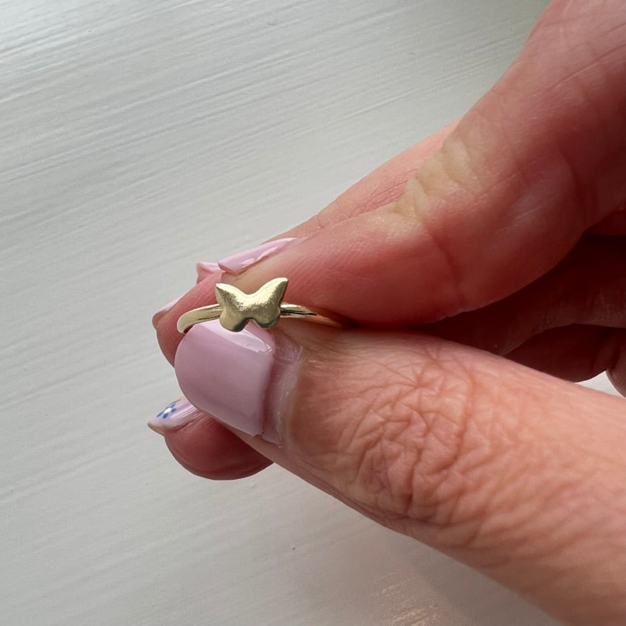 Delicate 14k gold butterfly stacker ring