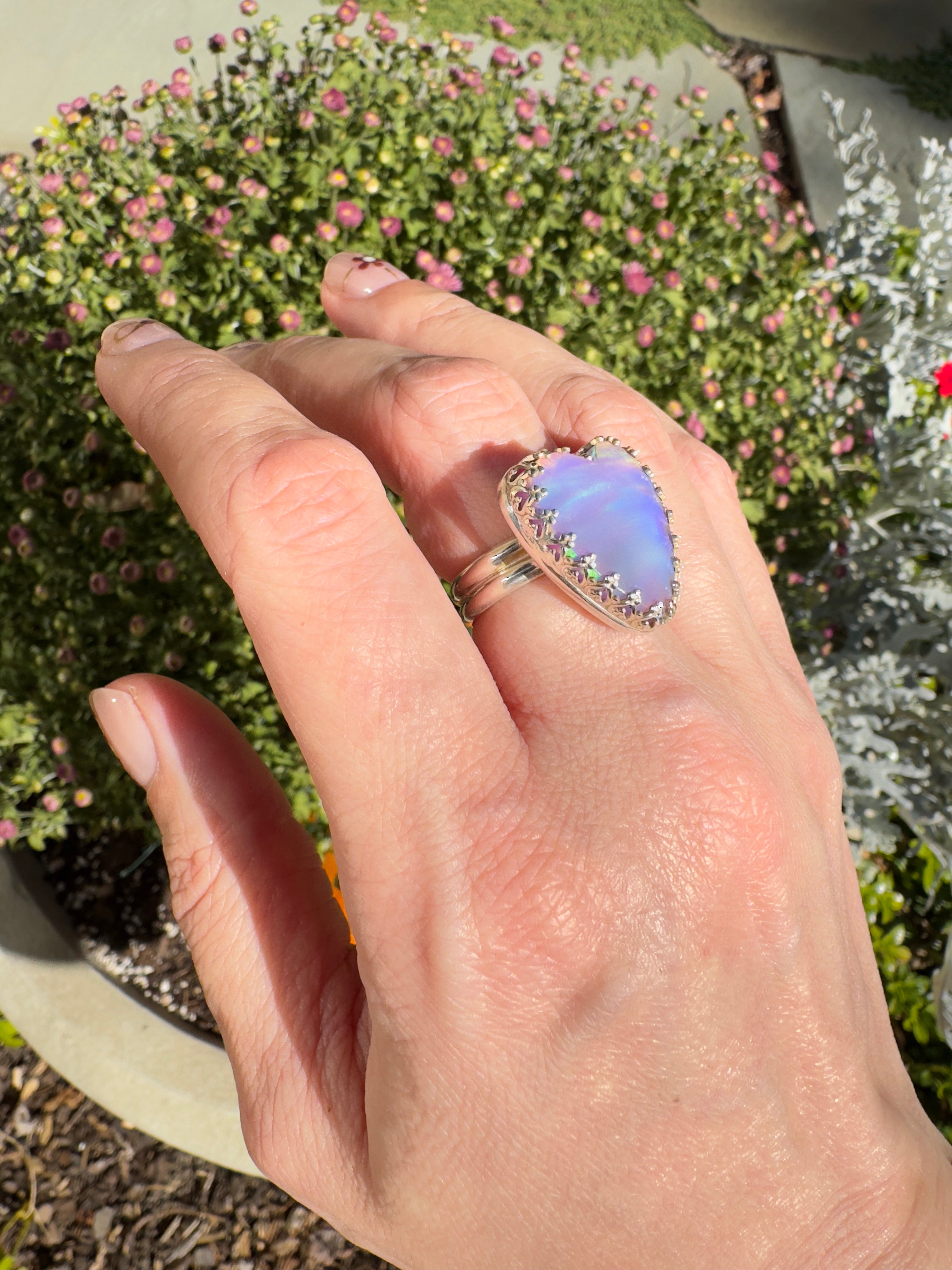 Beautiful heart shaped Aurora Opal on a wide sterling silver double band. One of a kind. The perfect pink ring for Valentine's Day. Size 7