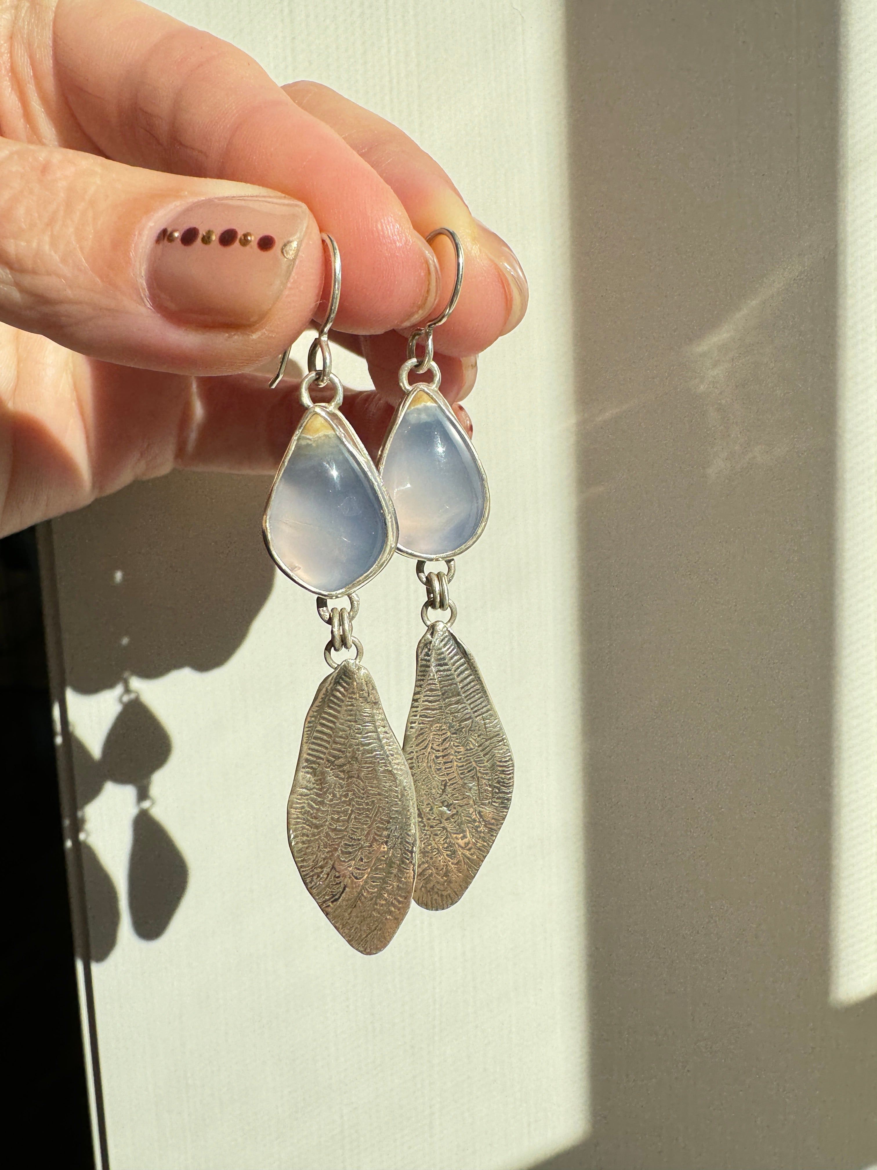 Sterling silver cicada wings with sparkling blue chalcedony. One of a kind pair.