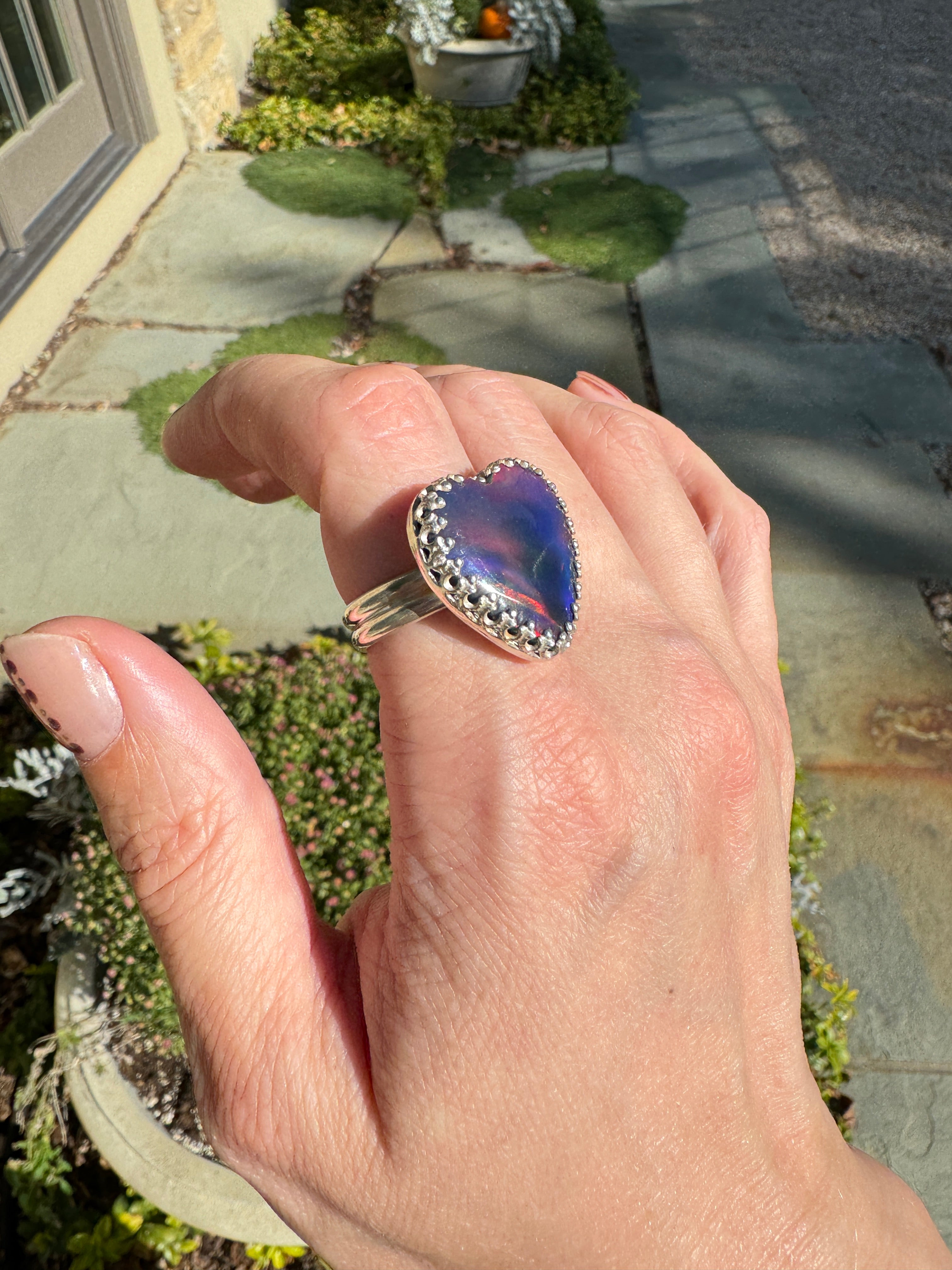 Beautiful heart shaped Aurora Opal on a wide sterling silver double band. One of a kind. The perfect heart ring for Valentine's Day. Size 9.25