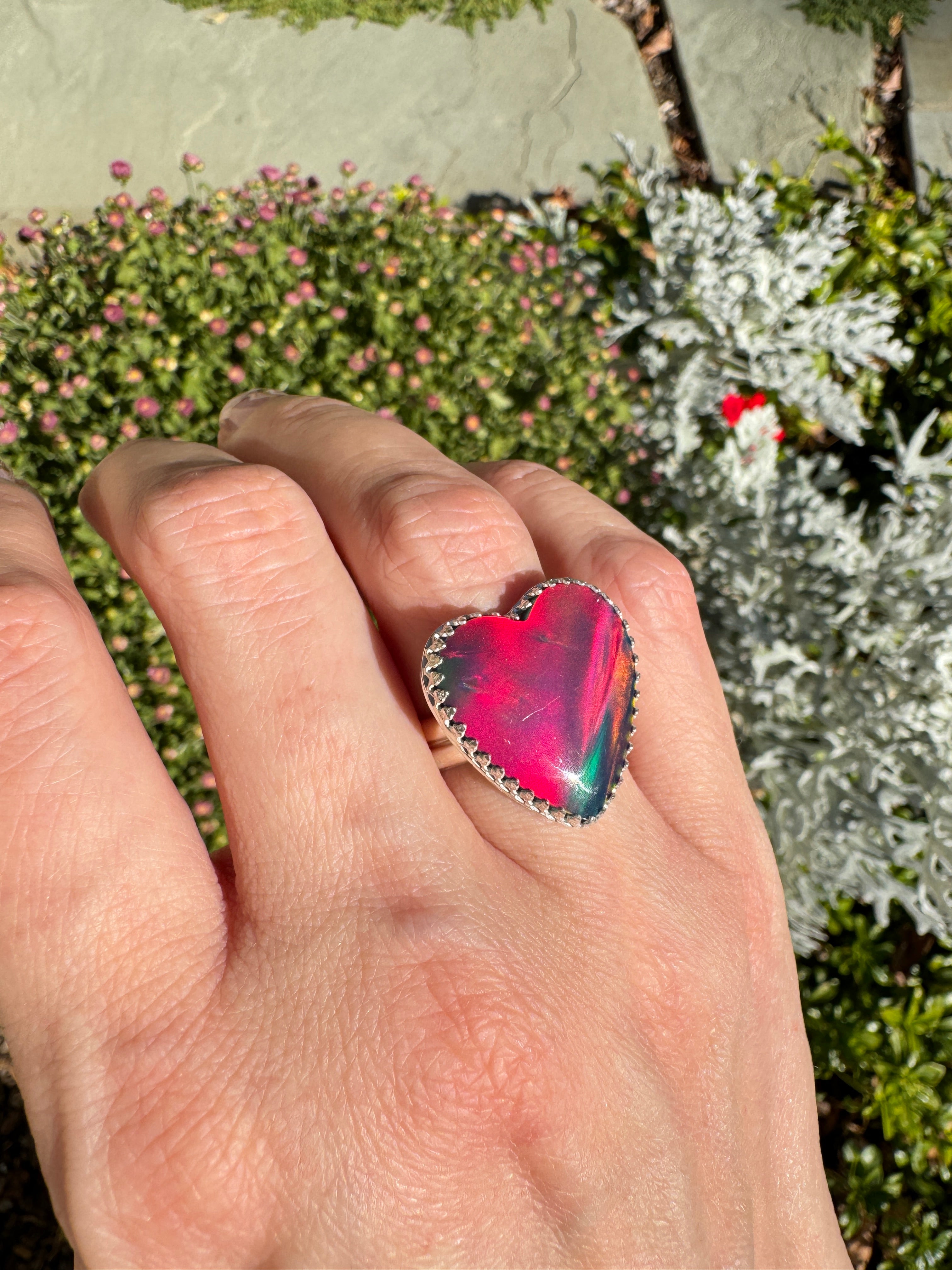 Beautiful heart shaped Aurora Opal on a wide sterling silver double band. One of a kind. The perfect heart ring for Valentine's Day. Size 6