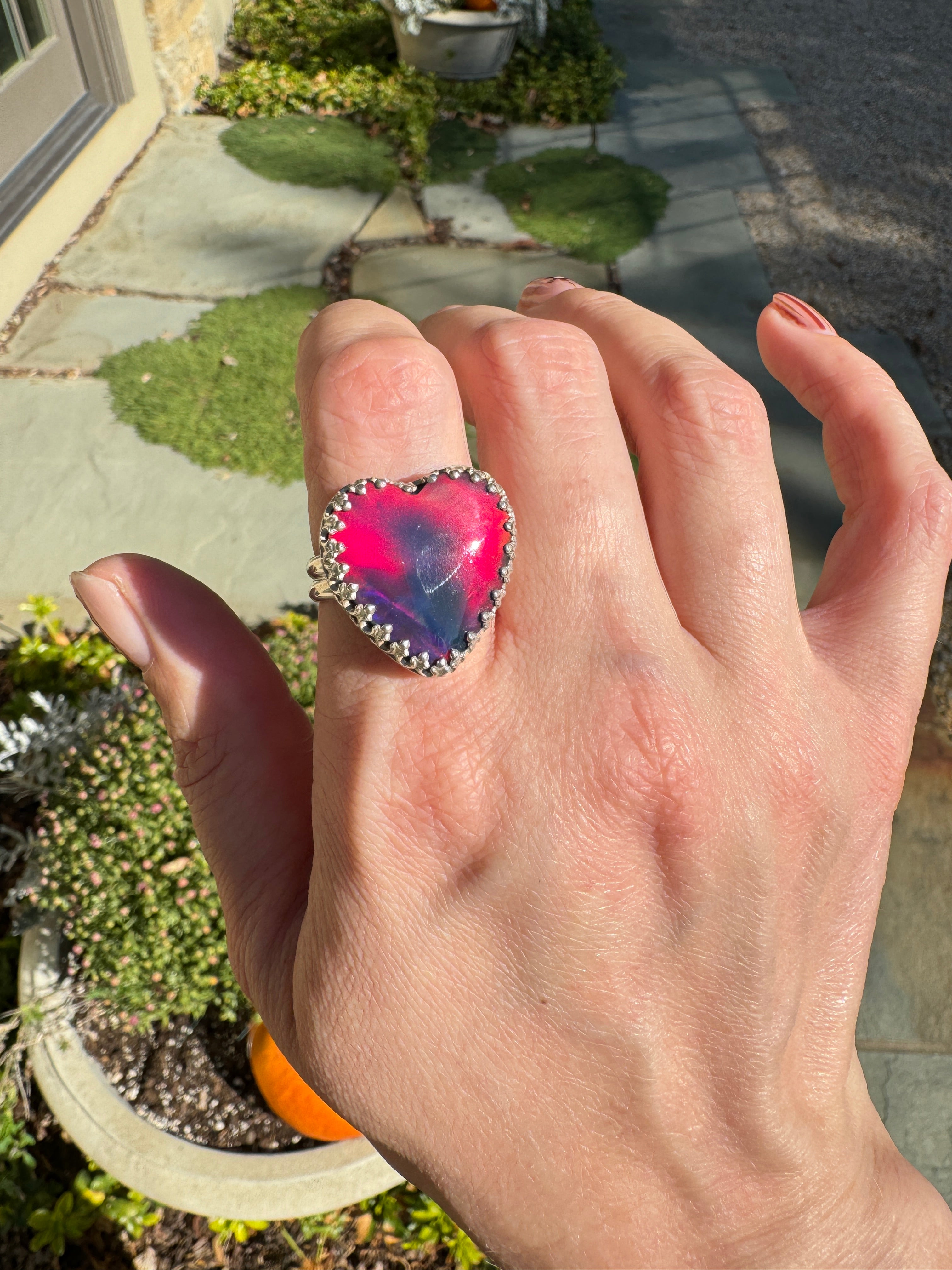 Beautiful heart shaped Aurora Opal on a wide sterling silver double band. One of a kind. The perfect heart ring for Valentine's Day. Size 9.25