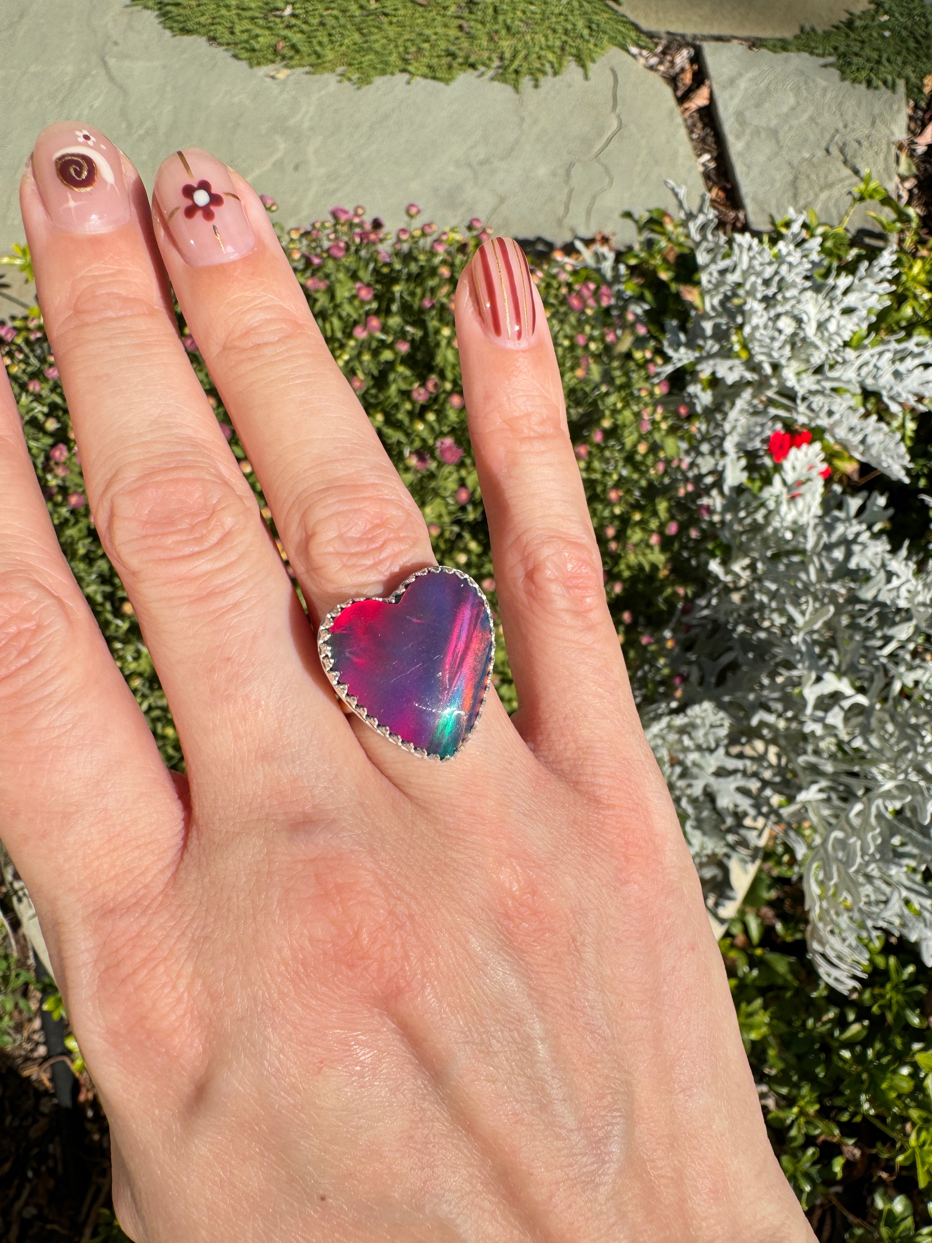 Beautiful heart shaped Aurora Opal on a wide sterling silver double band. One of a kind. The perfect heart ring for Valentine's Day. Size 6