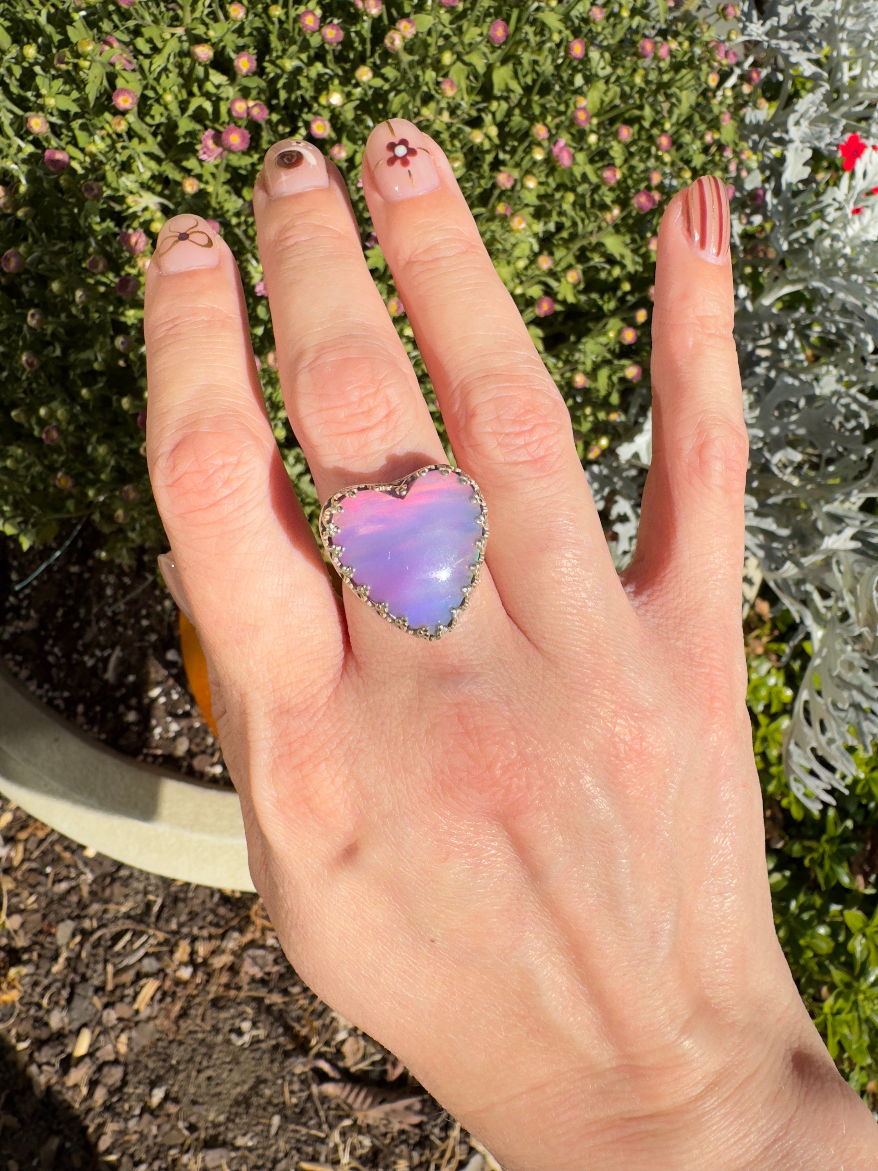 Beautiful heart shaped Aurora Opal on a wide sterling silver double band. One of a kind. The perfect pink ring for Valentine's Day. Size 7