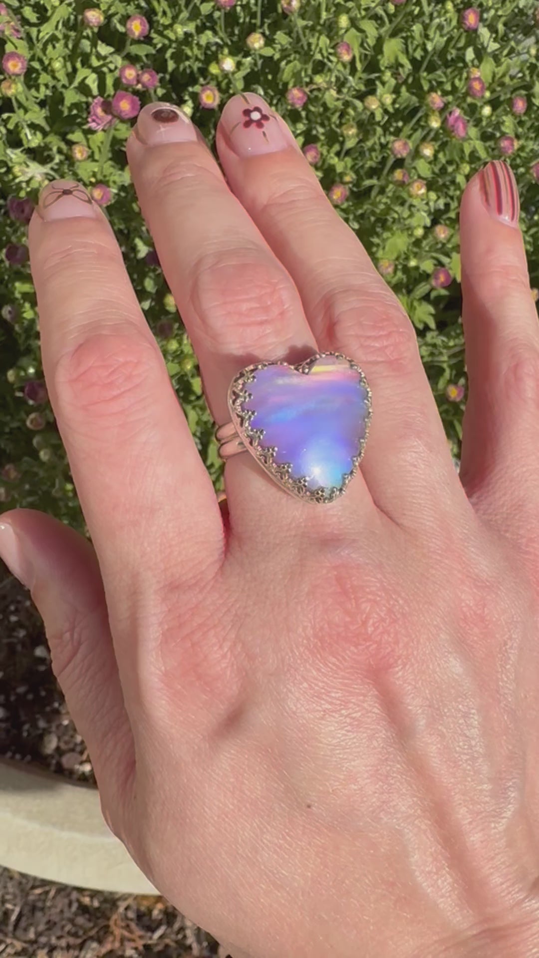 Beautiful heart shaped Aurora Opal on a wide sterling silver double band. One of a kind. The perfect pink ring for Valentine's Day. Size 7